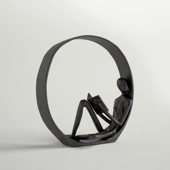 Krahn Encircled Reader Iron Figurine