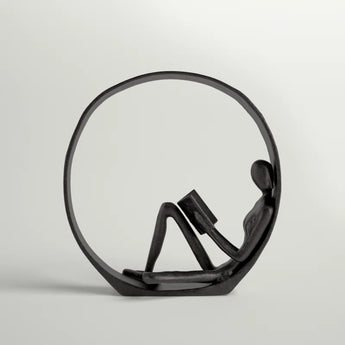 Krahn Encircled Reader Iron Figurine